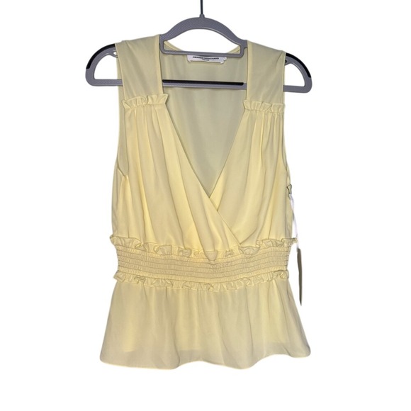 Amanda Uprichard Tops - NWT Amanda Uprichard New York pale yellow‎ ruffle blouse